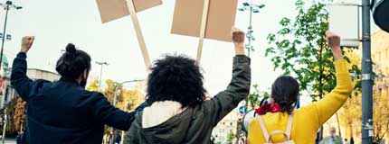 People holding signs and marching