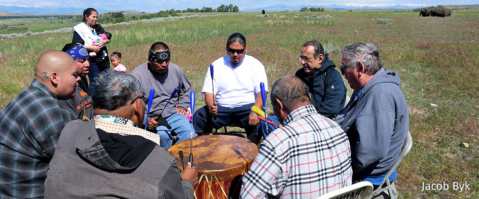 Group of adults participating in drum circle