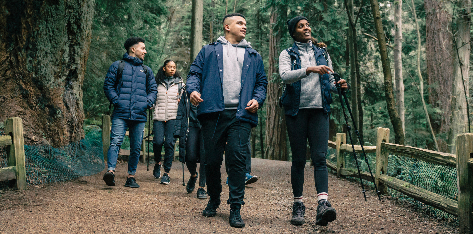 people walking on a trail